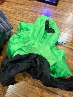 Alien holding person costume