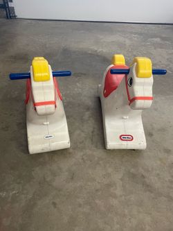 Set of two vintage Fischer Price rolling ponies