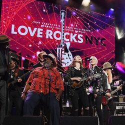 Love rocks NYC with Paul Simon and Billy Gibbons
