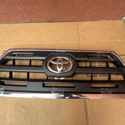 2016-2021 Toyota Tacoma Front Bumper Grille W/ Emblem OEM