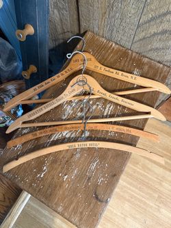 4 piece vintage advertising hanger lot