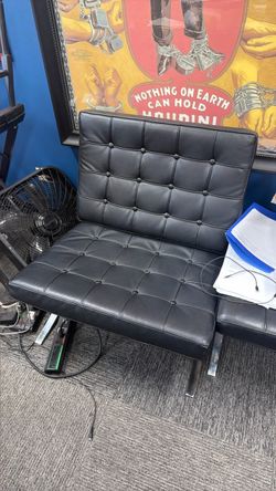 Barcelona Chairs, ottomans, and couch