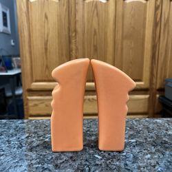 Modern Art pair of  Salt And Pepper Shakers.  Size approximately 4 inches tall.  Preowned never used display only.  
