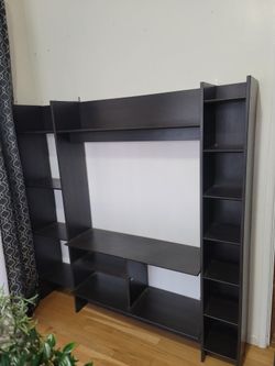 SELLING A LARGE  CABNET WITH MANY SHELS TO DECORATION  VERY STURDY  HEAVY  WITH ANCOR