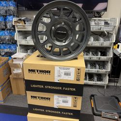 17x8.5 Method MR703 Bead Grip Gloss Titanium Wheels 5x150 (35mm) Set of 4