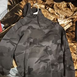 Camo hoodie fits like medium