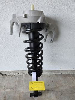 NEW Left front strut assembly for a 2003-2007 cadillac cts