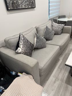 Light Gray Fabric Sofa with bed and Throw Pillows