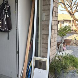 Doggie door  into a sliding  door