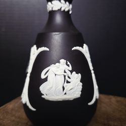 Wedgwood Black Jasperware Bud Vase, specifically featuring a white relief of a chariot scene. 5" 