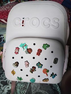 Pink crocs backpack with charms