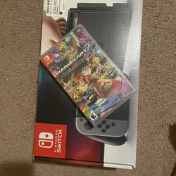 Selling Nintendo switch PLUS mario kart deluxe
