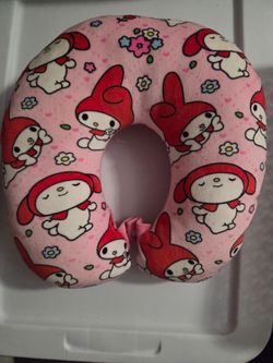 Hello kitty neck pillow and figurine