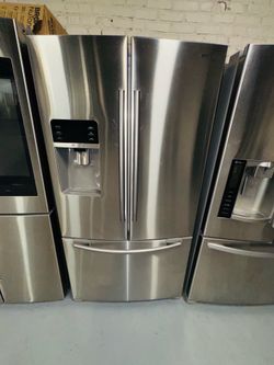Samsung stainless steel refrigerator (36" x 69" x 29") with a receipt for a 90-day warranty