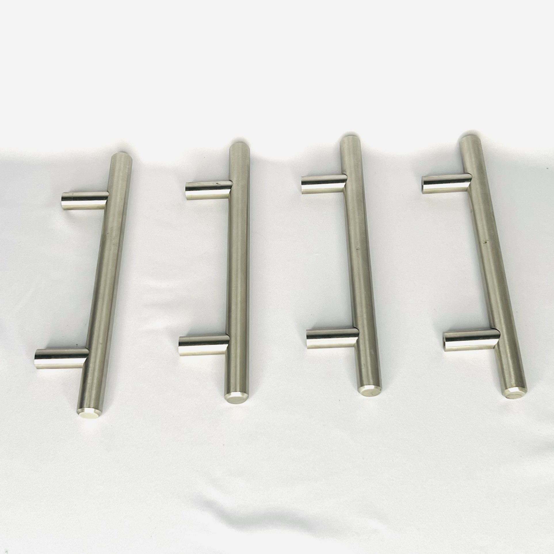 Four 3-3/4" Hole Center Cabinet Pulls