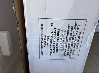 7.5 ft flocked Christmas tree