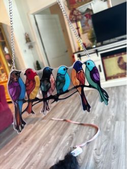 About 8” bird suncatcher