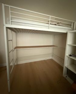 Single loft bed with a desk