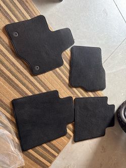 Selling a full set of 4 OEM Ford carpet floor mats removed from a 2025 Ford F-150 Lightning.