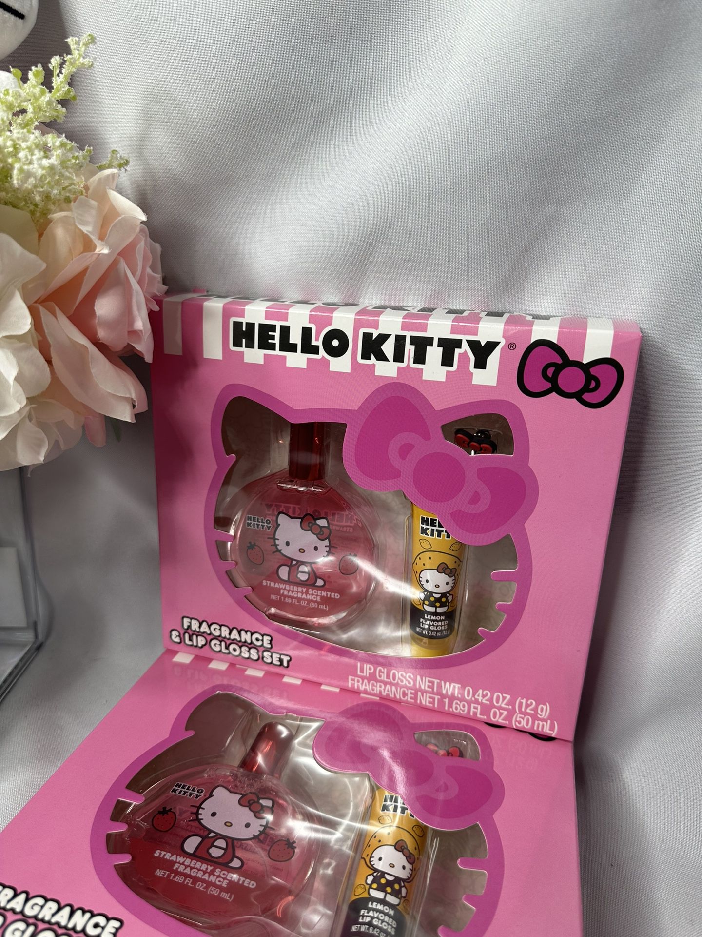Hello kitty fragrance + lipgloss set $10 each 