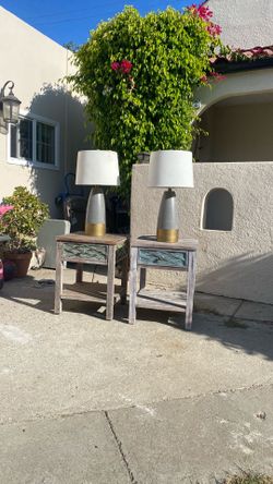 Beautiful set two end tables with two lamps working well  great style clean good condition