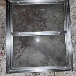 Aluminum window for exterior door