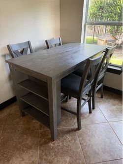 Dining table and 4 chairs