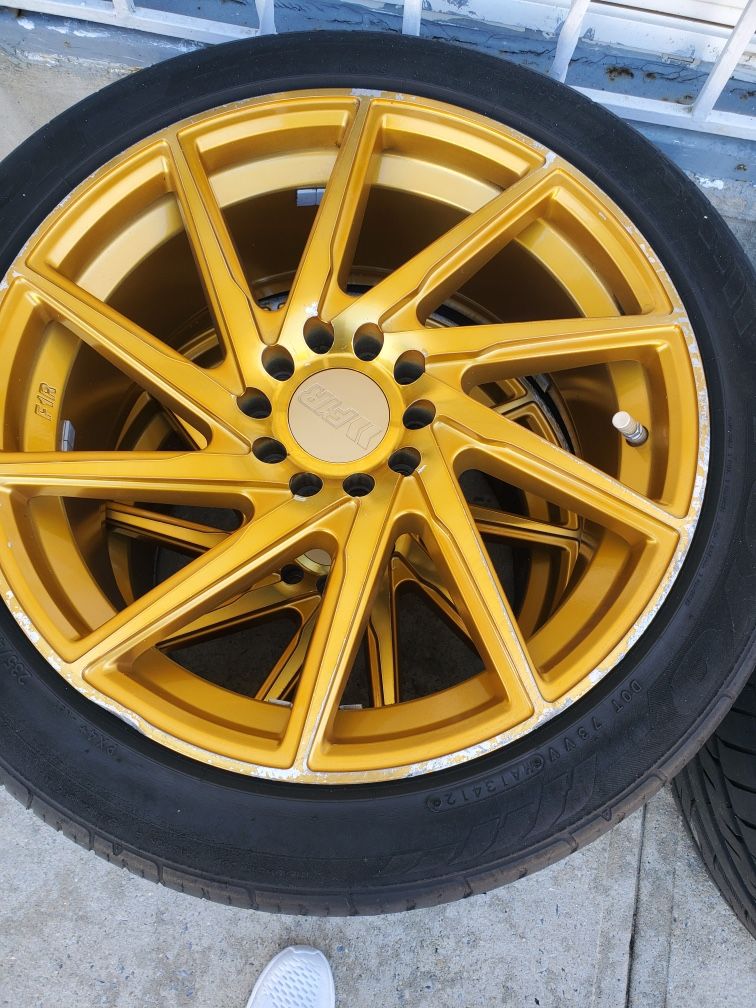 Gold rims . With ties . 200 obo Honda Nissan and more .