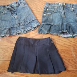 3 blue skirts with shorts size 4