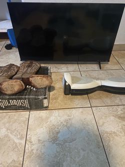 Roku Tv, cowboy boots, and a hoverboard for only $160
