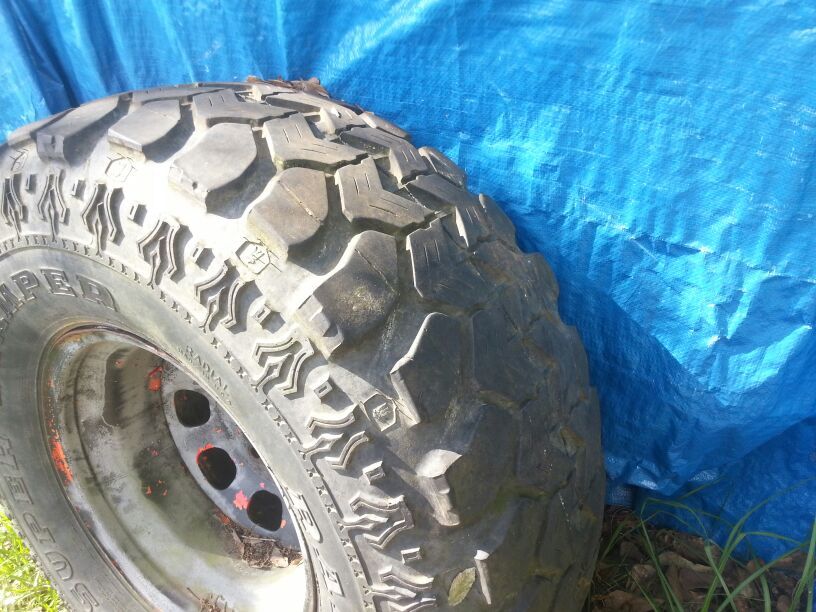 TWO 33x14.50R15 Super Swamper TSL Mud Tires & rims