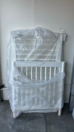 White baby crib