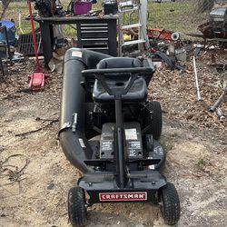Riding lawnmower 28 inch cut 12 1/2 horse Briggs engine electric start with bagger