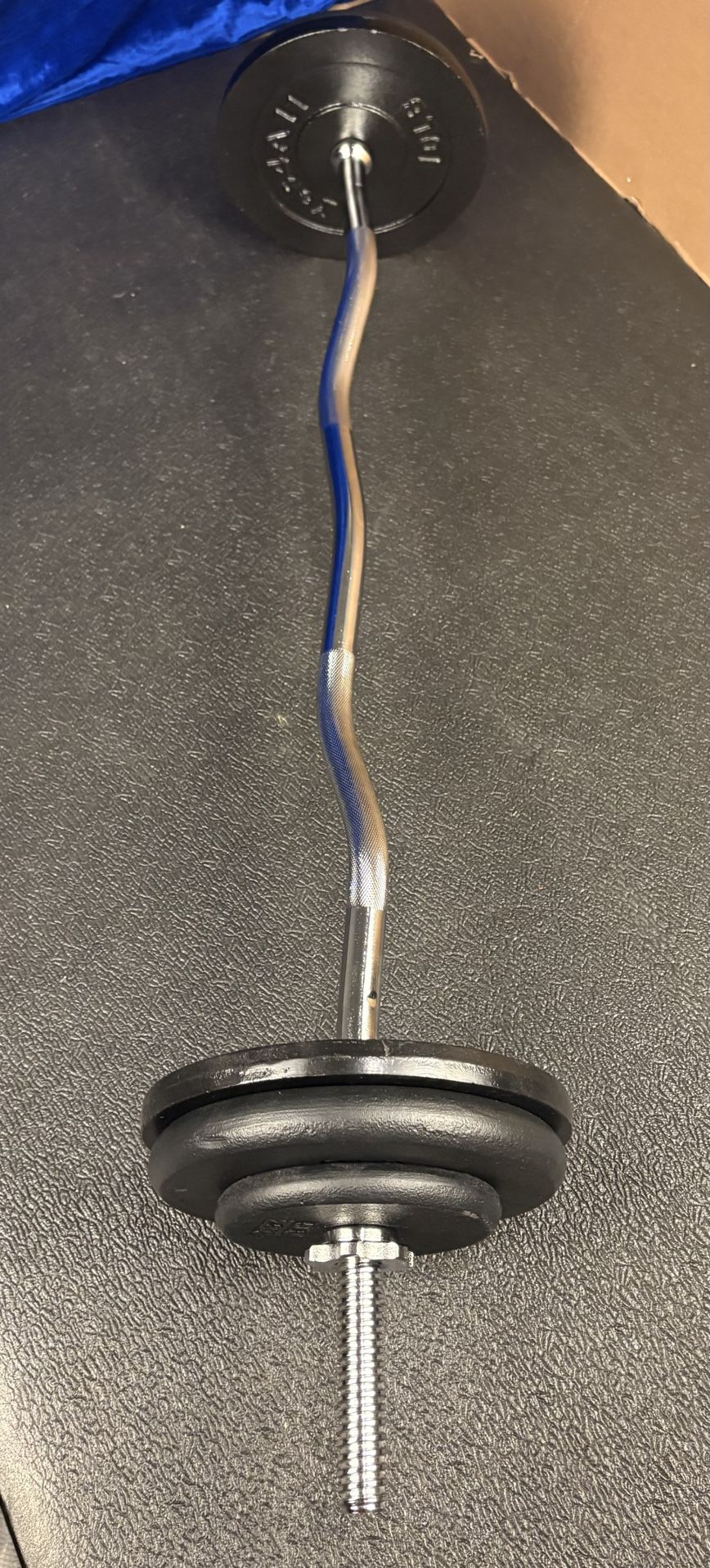 Standard Steel Curl Bar with Cast Iron Weight Plates pairs: 15#, 10 & 5 #. Total: 76 pounds