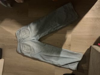 Light Wash Denim Jeans with Embroidered Pockets