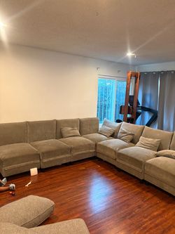 Large Gray Sectional Sofa with Pillows