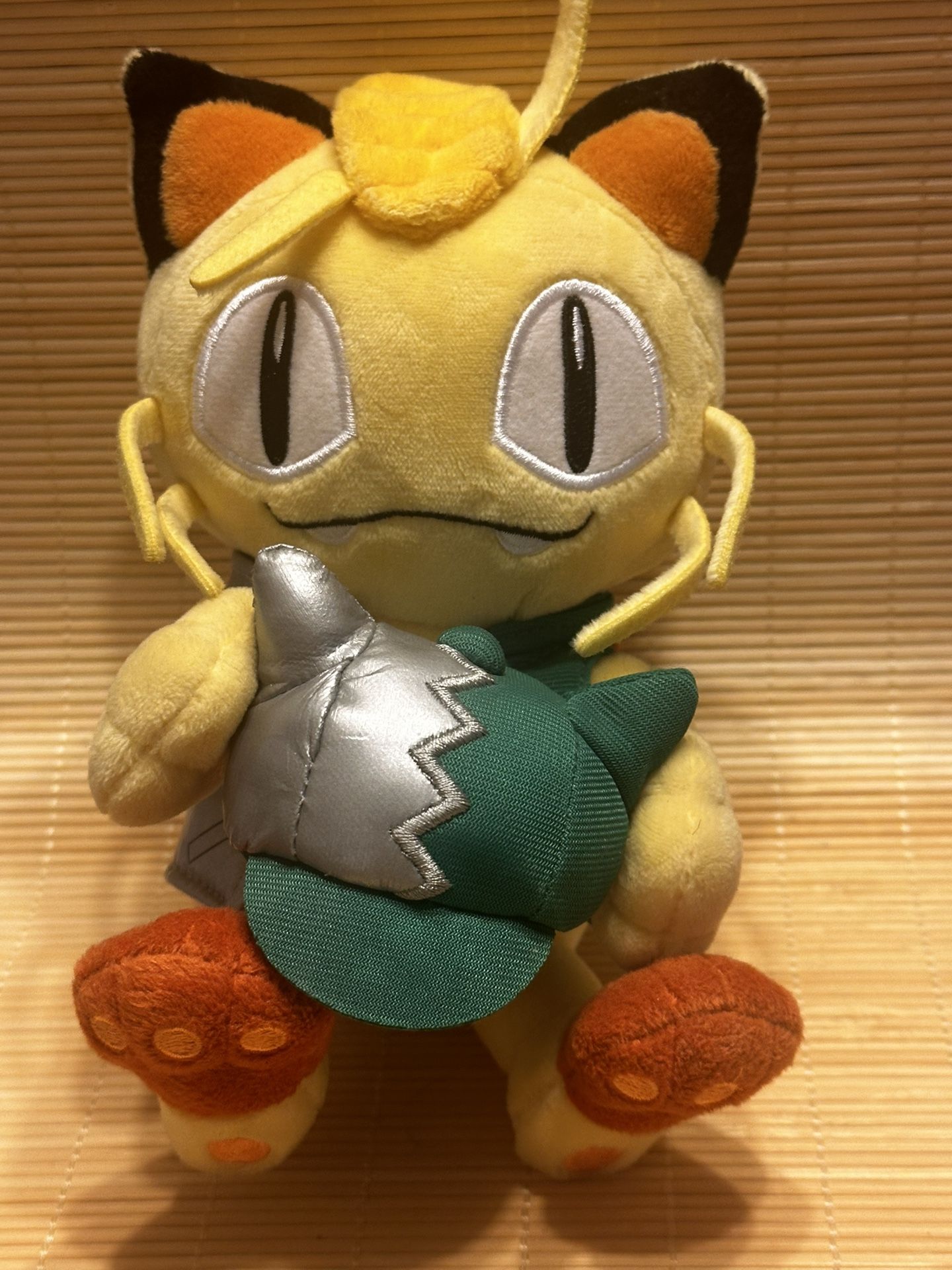Pokémon Meowth 2016 World Championship exclusive plush toy.