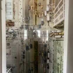 This picture was taken many years ago with our old World Trade Center before it collapsed from a helicopter professional photograph. It is glass askin