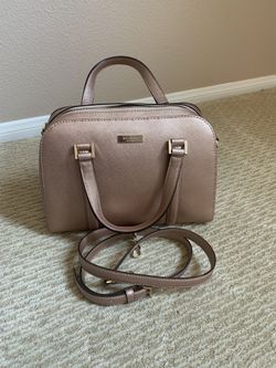 Kate Spade Satchel purse is a dream mix of streamlined sophistication and everyday ease. worn crossbody, in the crook of your elbow or carried in han