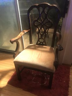 Arm wood Chair cushion small defect in the wood a lot of life left.