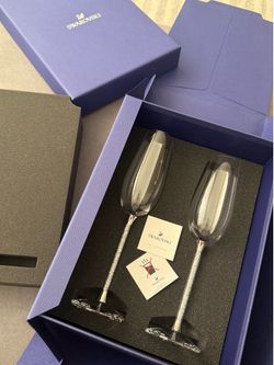 Brand new Swarovski Crystal Champagne Flutes with Silver Crystal Stems