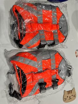 Two dog life vests Size M