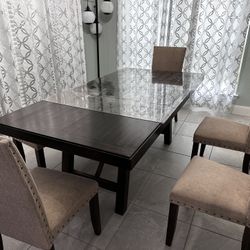 Dinning Table Including Chairs And A bench