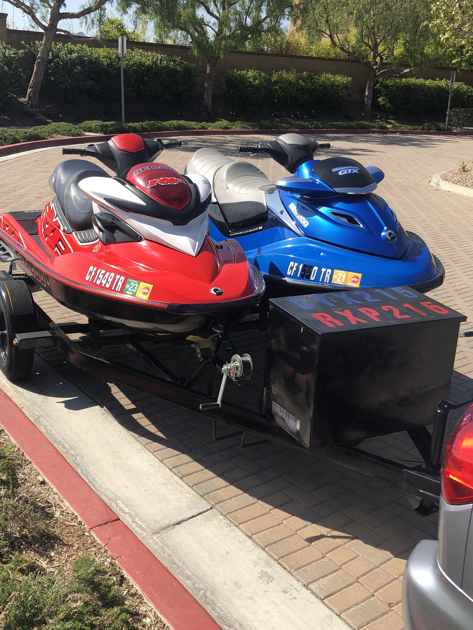 For sale 2 Jet Skis And Double trailer.  Blue Sea Doo 2007 GTX 215 Supercharged Limited edition, Red Sea Doo 2007  RXP Supercharged.  Zeiman trailer