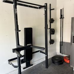PRX squat rack with bench press and weights 