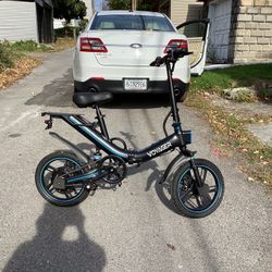 Electric Bikes.        $450.00 Each One.  I Paid  1200.00 Both.  Voyager Radio us Pro. 450 Watt