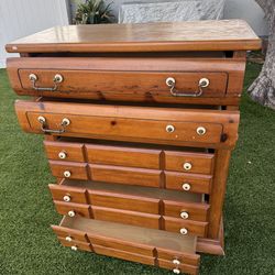 Antique chest of drawers with many drawers