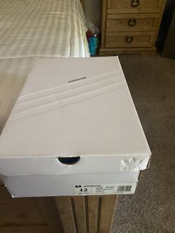 All white “Superstar Shelltoe Adidas,size 12