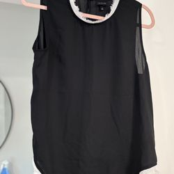 Black Sleeveless Top with White Trim