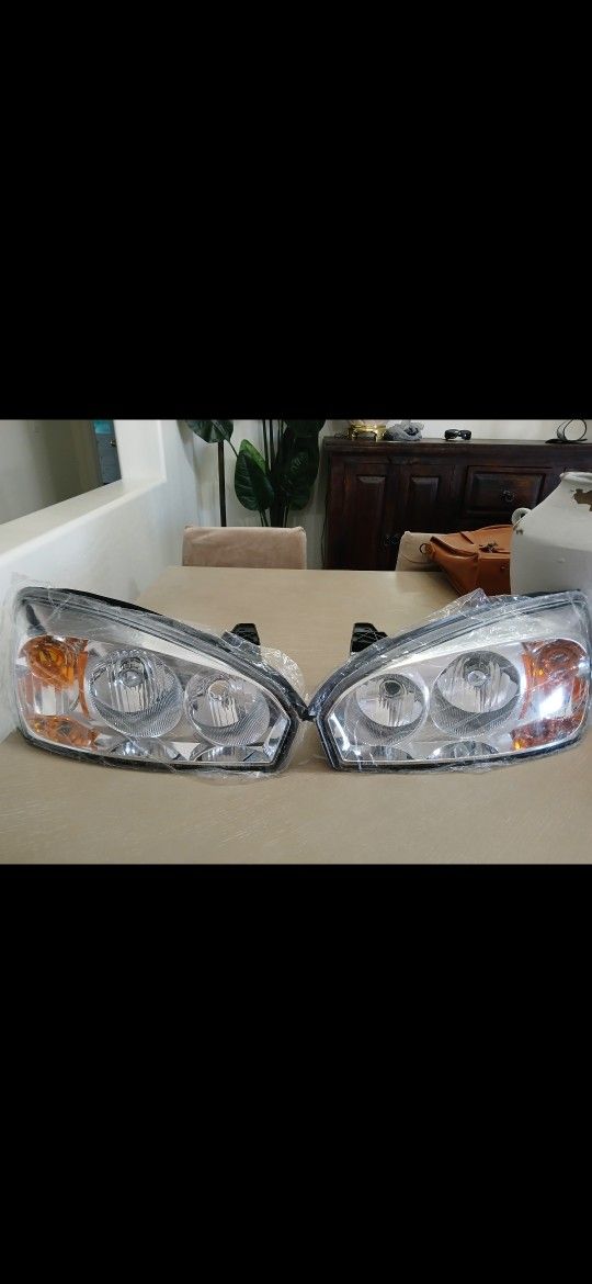 2004-2007 Chevy Malibu New Headlamps Headlights $99 Both Pair